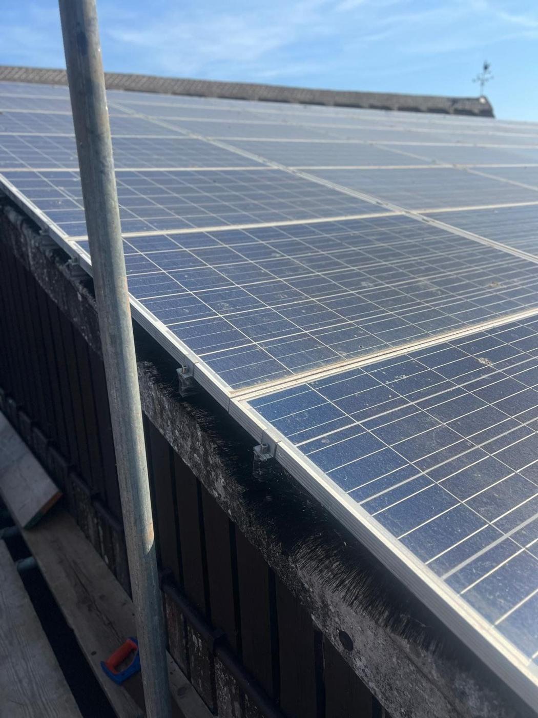 Old array on the farm roof before the work