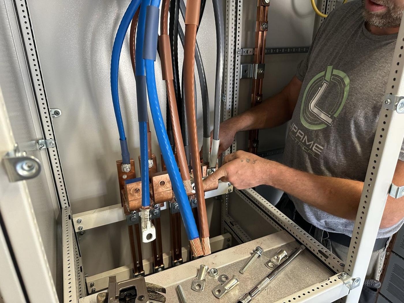 Engineer terminating SWA on busbar chamber