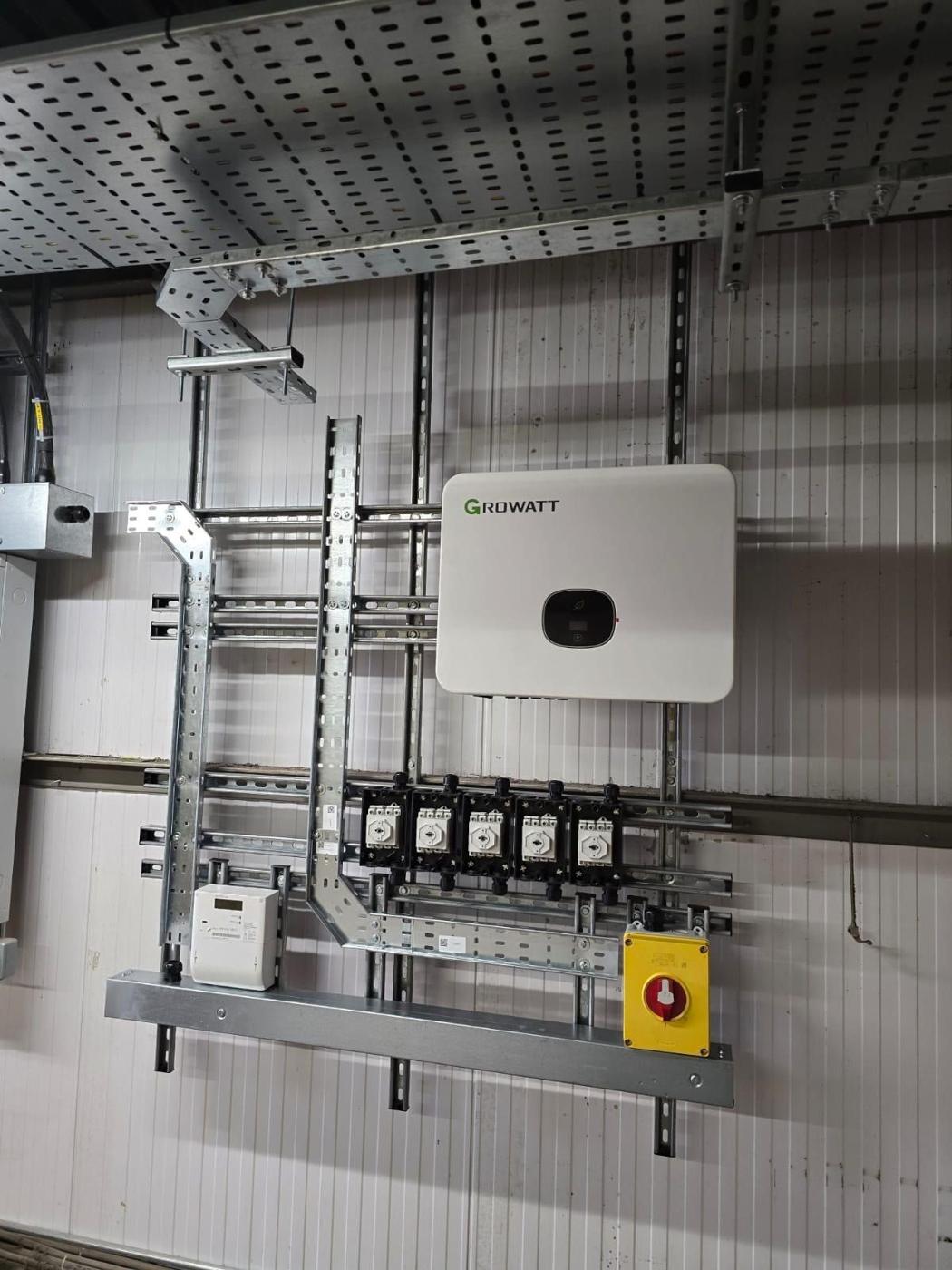 Growatt inverter with DC isolators and meter on strut frames