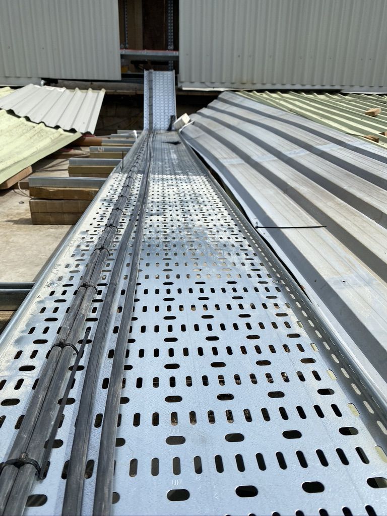 Cables dressed on perforated tray