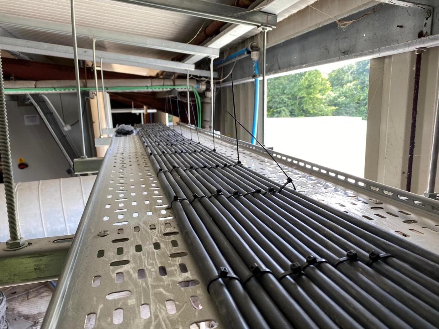 Cable tray full of cables above the line