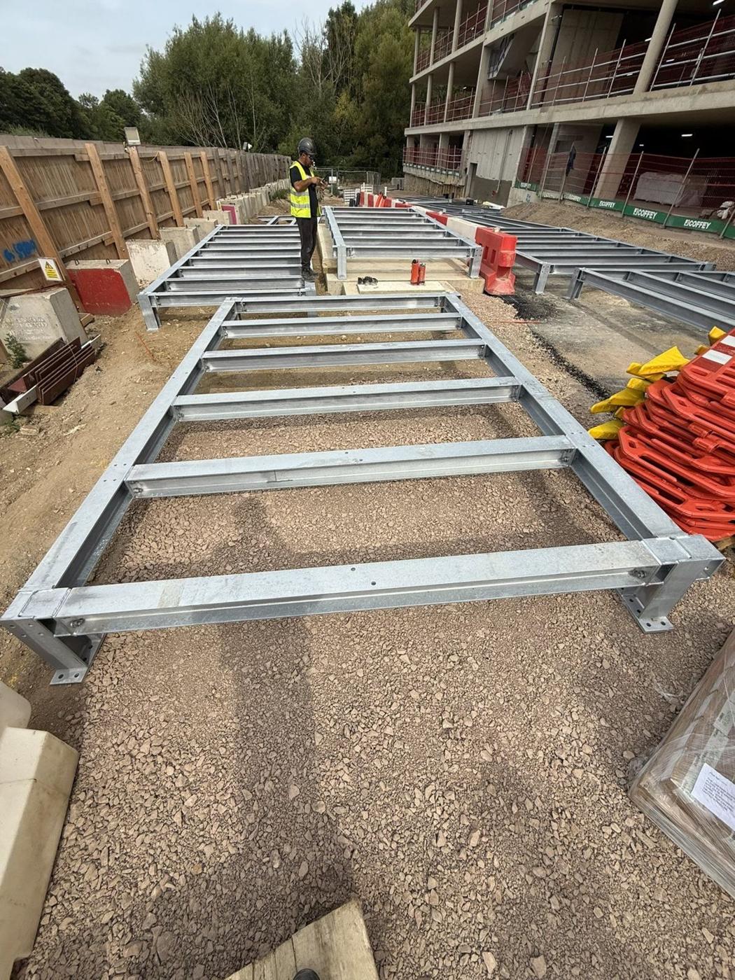 Galvanised PV mounting frames laid out on the roof