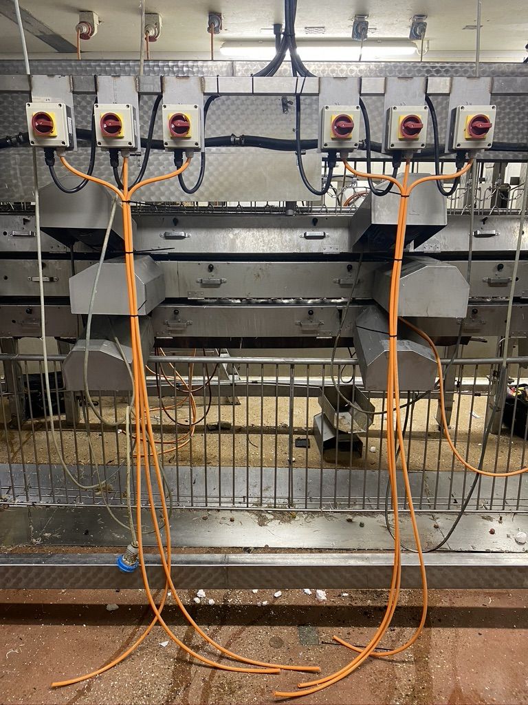 Isolators on the line frame with orange motor cables