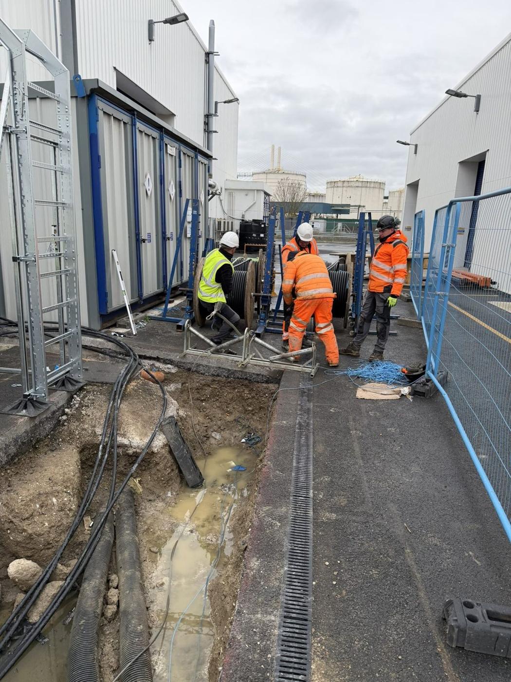 Crew pulling SWA through external ducts
