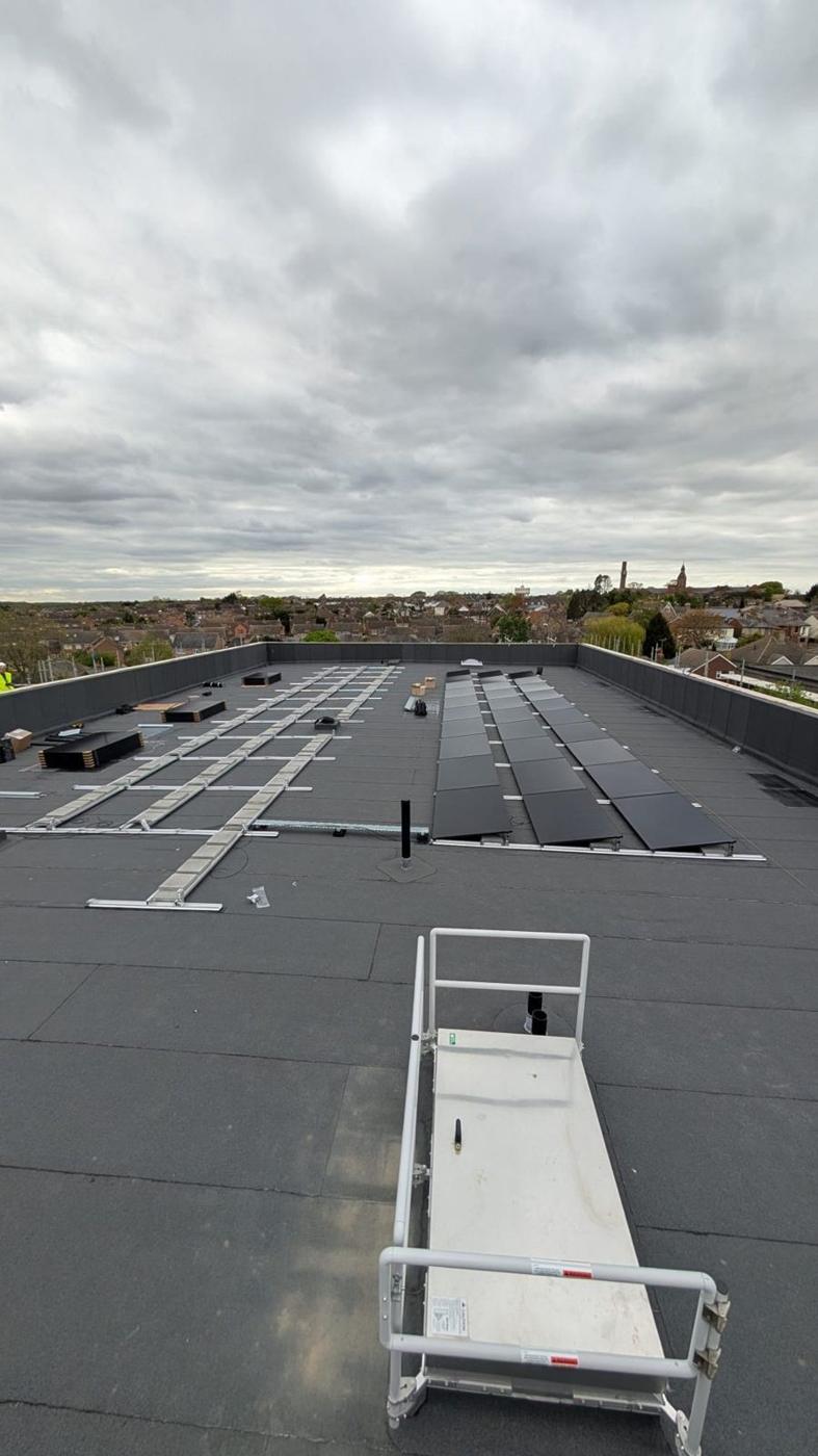 Frames laid out across the flat roof