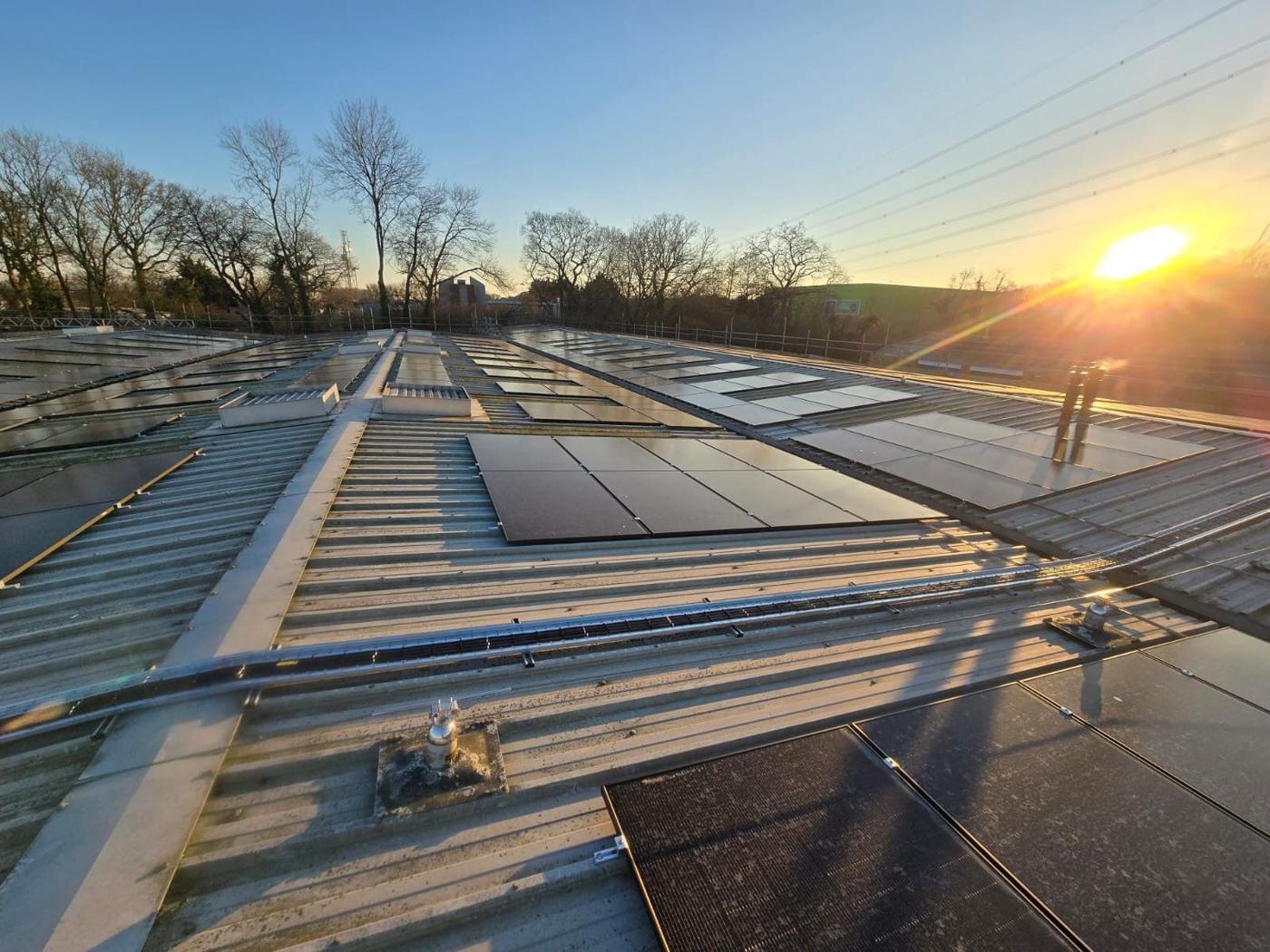Solar panels on the profiled roof at sunset