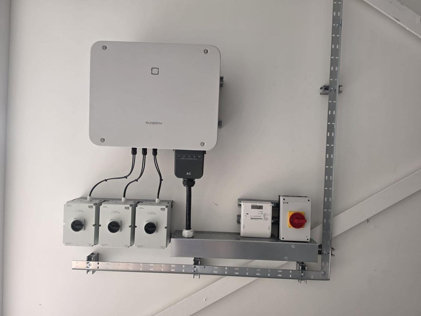 Inverter with DC isolators and meter on strut frame
