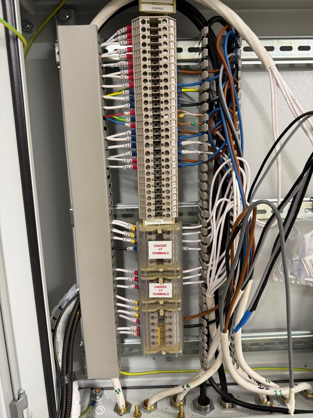 Terminal rail with field wiring and labelled cores