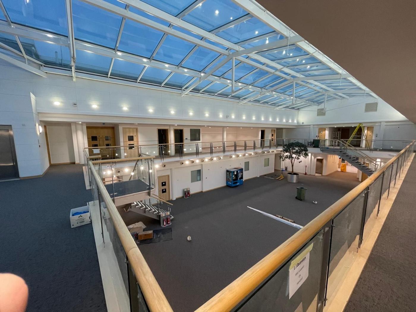 Atrium with new lighting along the galleries and glazed roof