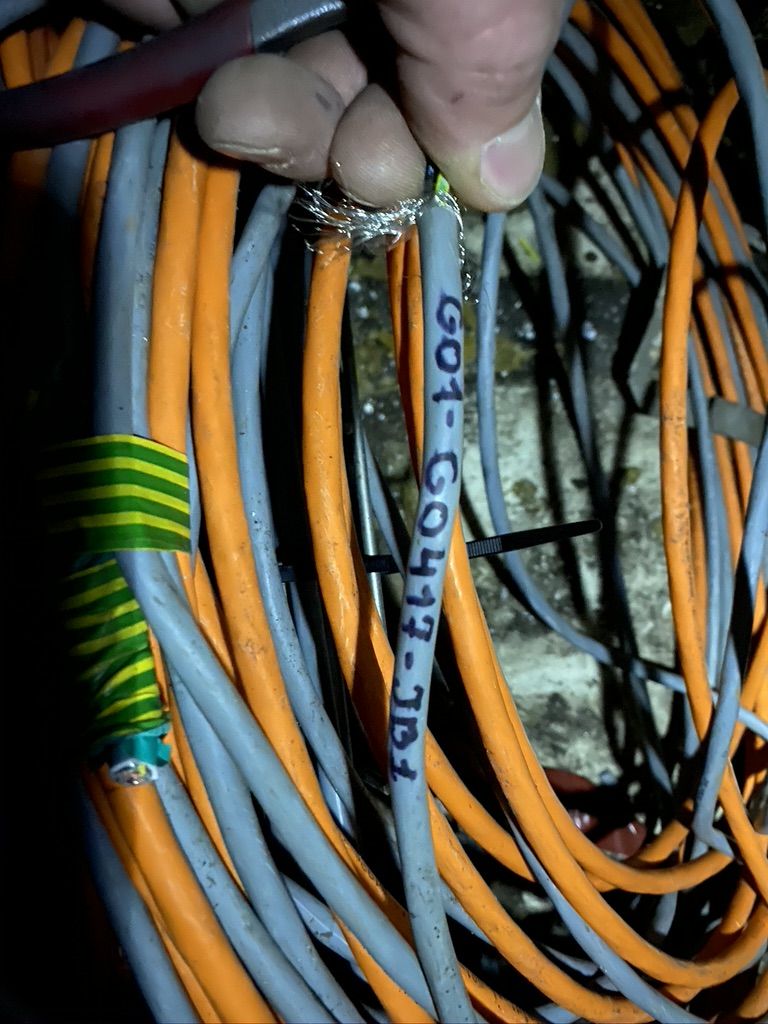Numbered orange control cores in a hand