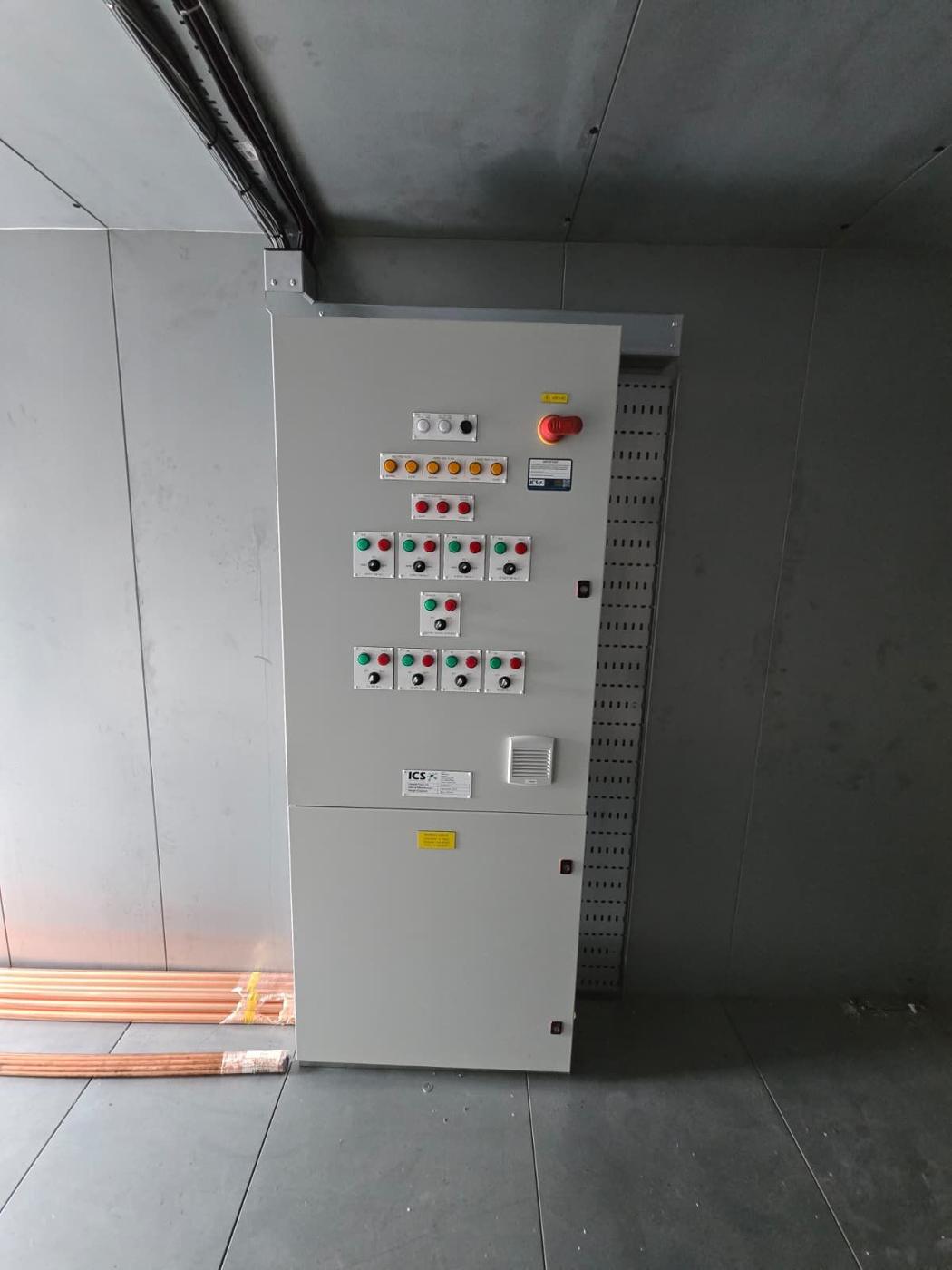 Floor-standing BMS control panel in a plant room