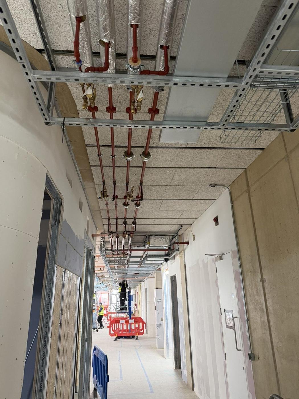 Containment running down a long corridor
