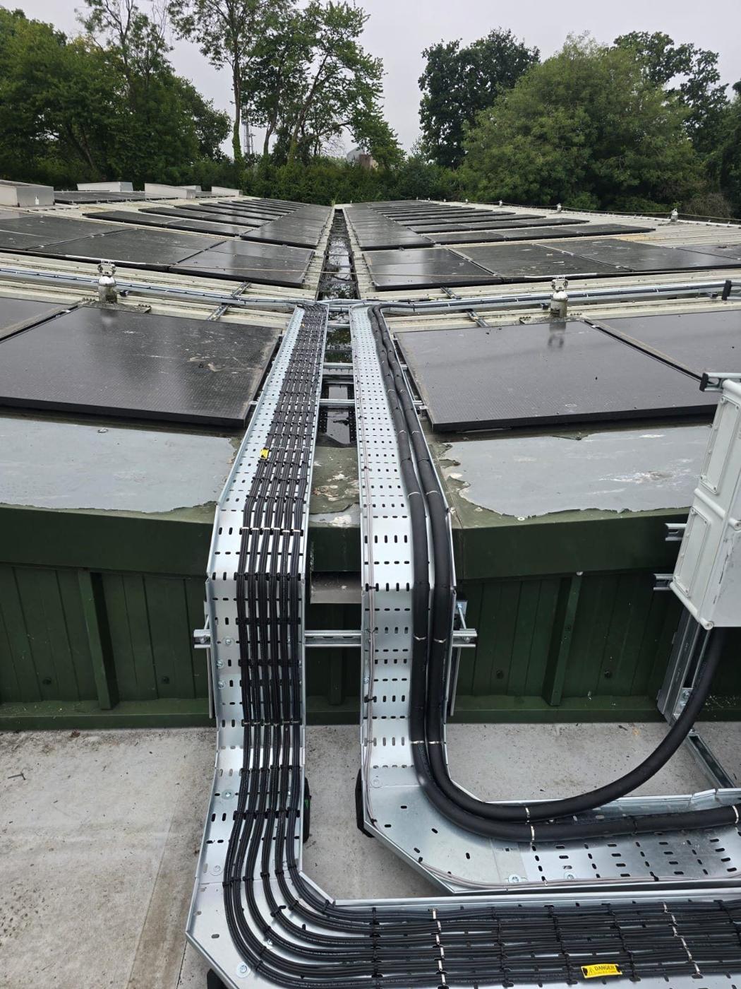 New DC cable tray across a solar roof in Winchester