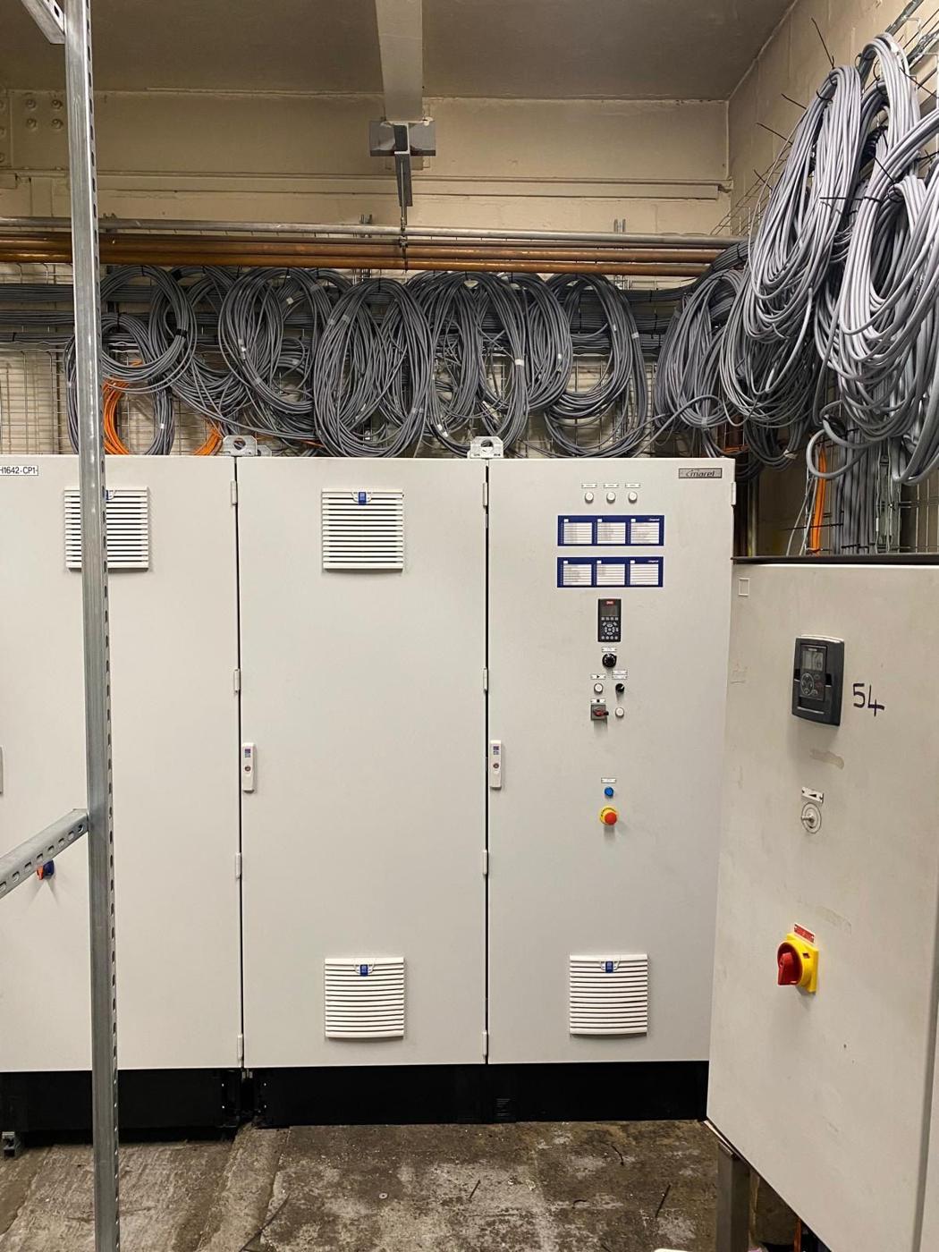 Row of control panels in a plant room