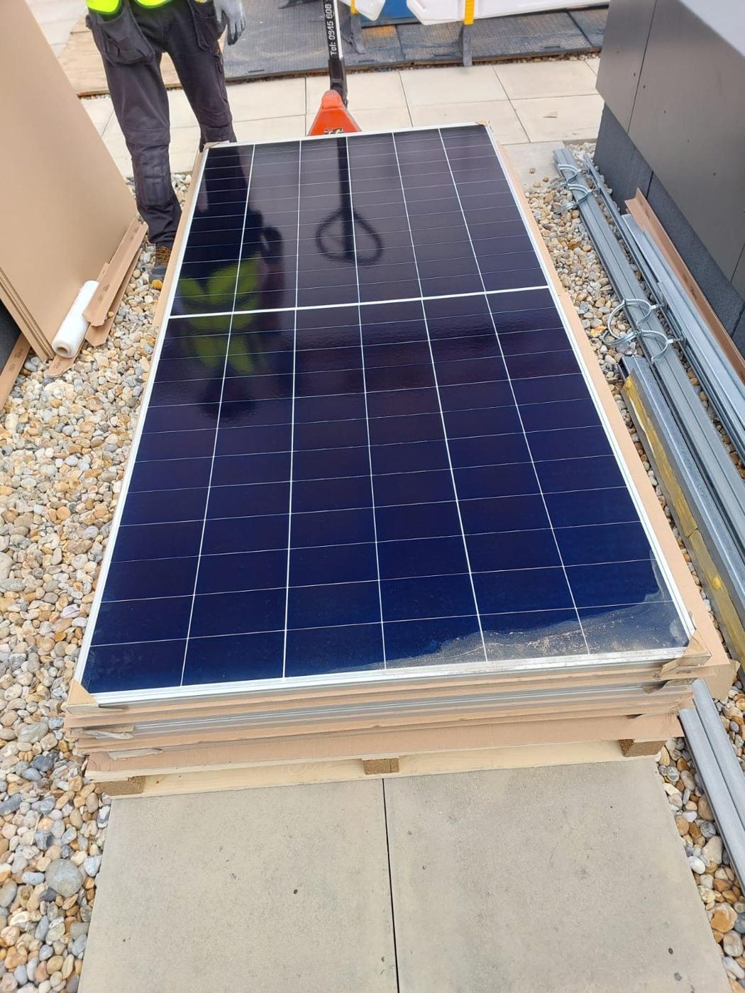 Removed panel inspected and placed on a pallet